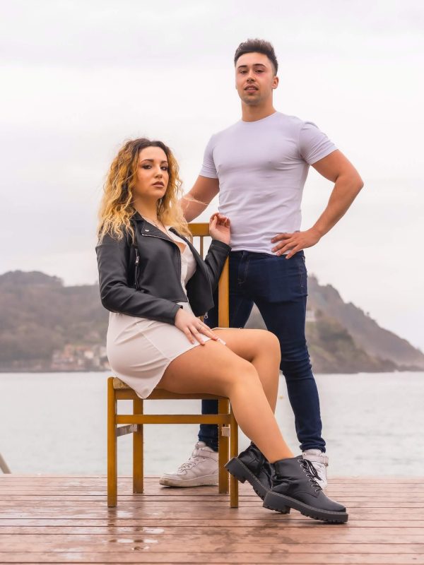 caucasian-couple-on-vacation-by-the-sea-young-woman-sitting-and-boy-next-to-her-1.jpg
